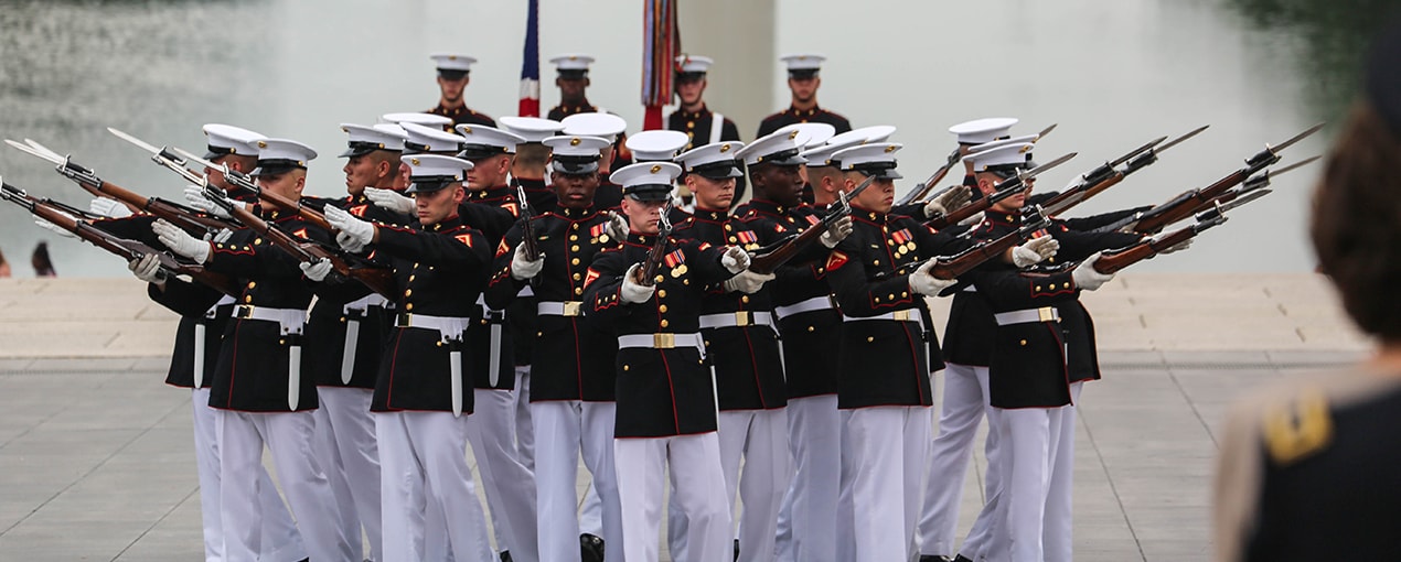 Marine Corps silent drill platoon in dress blues